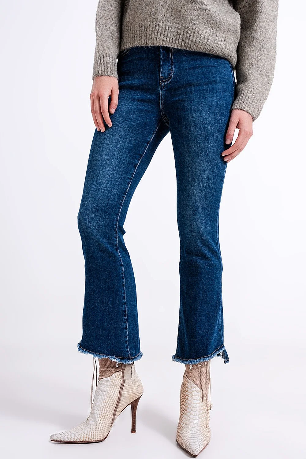 High Waisted Jeans With Asymmetrical Hem